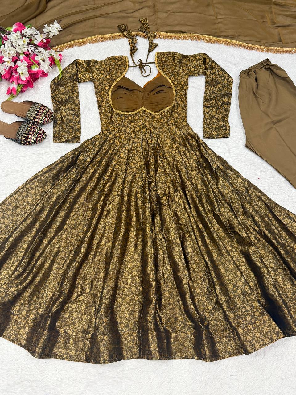 Opulent Mehendi Green Brocade Flared Anarkali Suit Set Featuring a Ruched Sweetheart Neckline, Woven Floral Motifs, and an Elegant Tie-Up Back